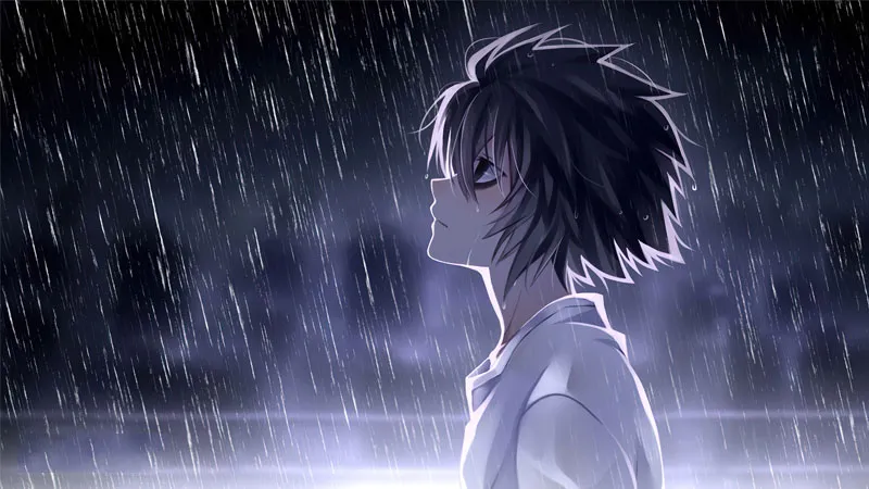 Chàng trai anime đứng một mình dưới cơn mưa đêm
