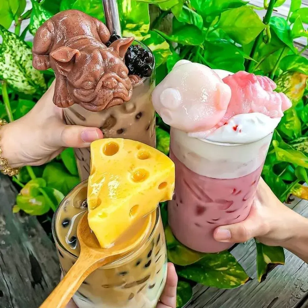 Hình ảnh trà sữa trân châu đường đen kem sữa