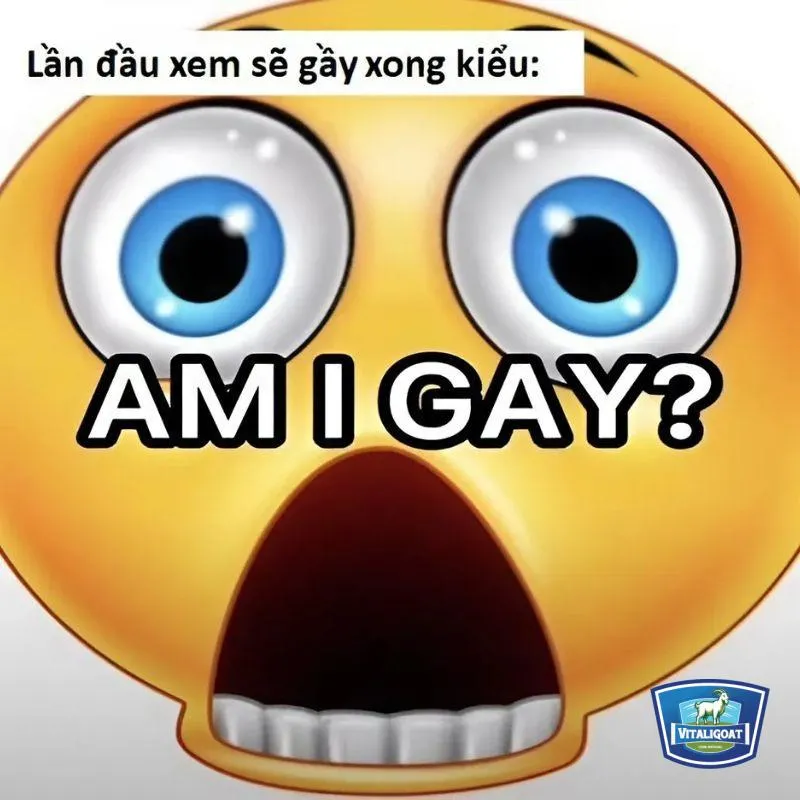 Meme một cô gái đang đỏ mặt vì bối rối, ánh mắt nhìn xuống và tay chạm má